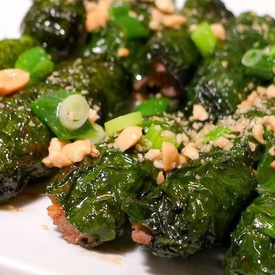 Grilled beef wrapped in wild betel leaf