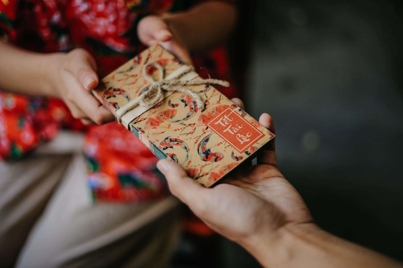 Close-up Of Vietnamese Red Envelopes With Money Being Presented On Tet  Stock Photo, Picture and Royalty Free Image. Image 67590594.